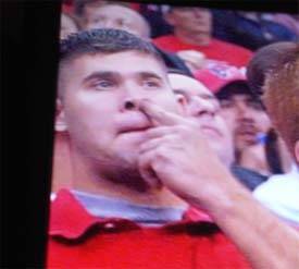 Texans fan picks nose